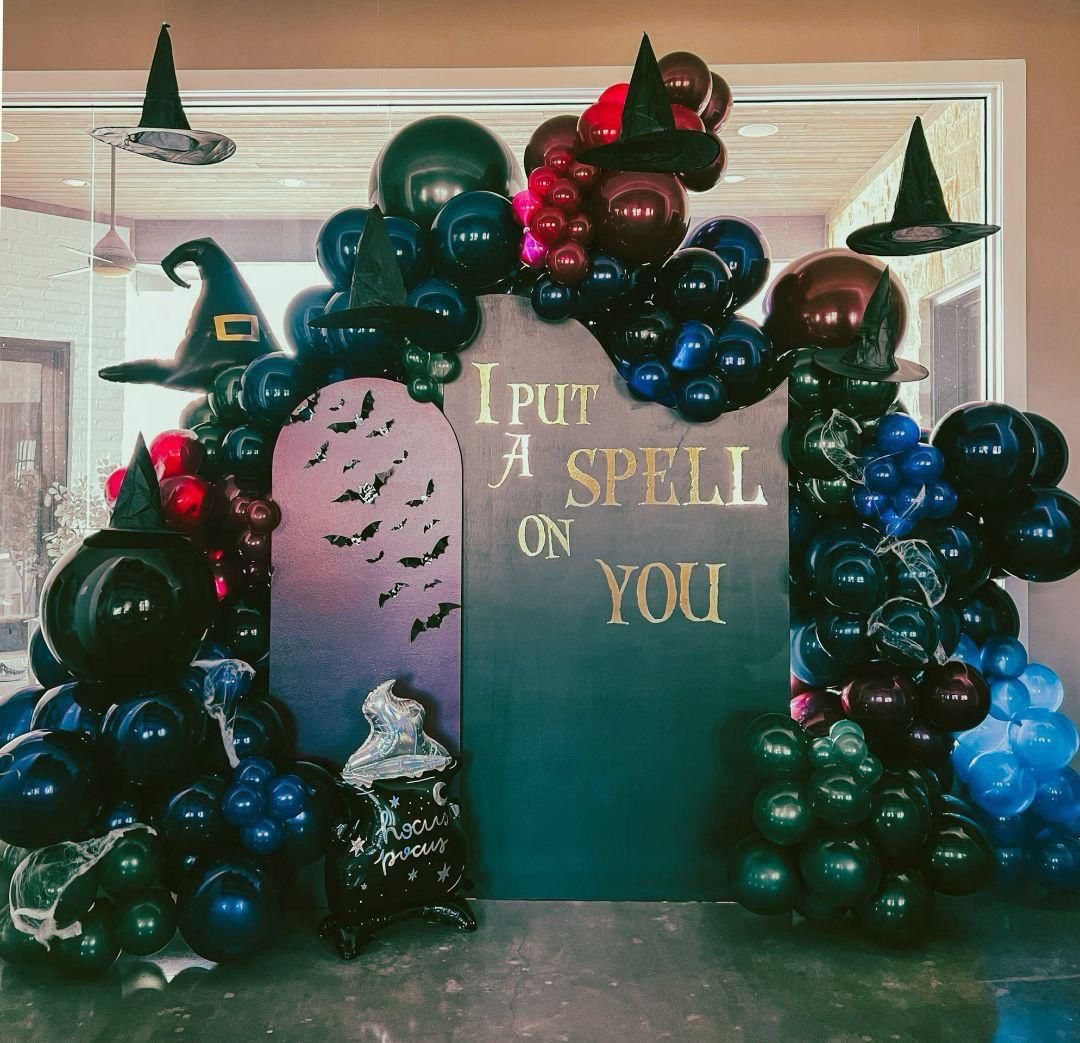 Halloween spell themed balloon backdrop rental